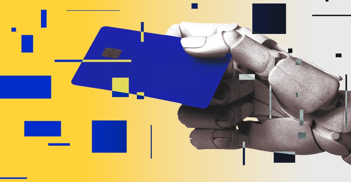 Robotic hand holding a credit card.